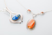 Lot 2056 - DANISH MODERNIST SILVER AND LAPIS PENDANT...
