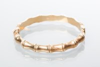 Lot 2059 - GOLD BAMBOO EFFECT BANGLE hallmarked 9ct, 15.1gms