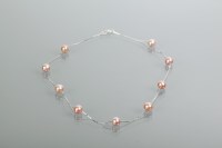 Lot 2090 - SILVER AND PINK PEARL NECKLACE set with...