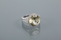 Lot 2090A - QUARTZ SET DRESS RING the large round cut...