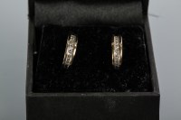 Lot 2092 - PAIR OF DIAMOND HALF HOOP EARRINGS set with...