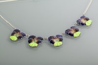 Lot 2125 - ARTS AND CRAFTS STYLE SILVER AND ENAMEL PANSY...