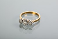 Lot 2157 - DIAMOND THREE STONE RING set with three...