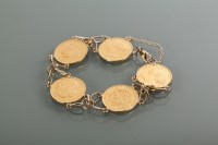 Lot 2159 - HALF SOVEREIGN BRACELET set with five...