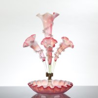 Lot 217 - CRANBERRY GLASS EPERGNE constructed of a...