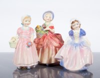 Lot 220 - THREE ROYAL DOULTON YOUNG LADY FIGURES...