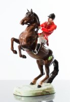 Lot 240 - BESWICK FIGURE OF A HUNTSMAN ON HORSEBACK...