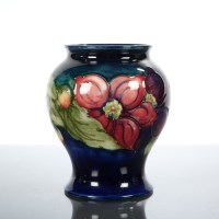 Lot 242 - MOORCROFT OVIFORM VASE painted with flowers in...