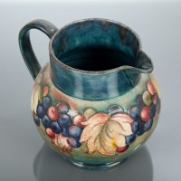 Lot 311 - MOORCROFT LEAF AND BERRIES JUG signed and...