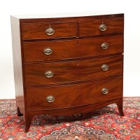 Lot 374 - VICTORIAN BOWFRONT MAHOGANY CHEST on splayed...