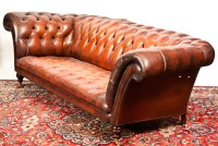 Lot 375 - TAN LEATHER BUTTONBACK SETTEE with turned...