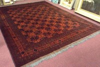 Lot 426 - AFGHAN HATCHLI CARPET 343cm long 254cm wide