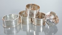 Lot 20 - COLLECTION OF FIVE SILVER NAPKIN RINGS...