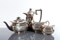 Lot 39 - SILVER COMPOSITE FOUR PIECE TEA SERVICE three...