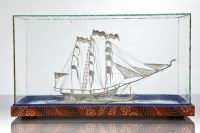 Lot 62 - CONTINENTAL SILVER FILIGREE SHIP in a perspex...