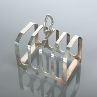 Lot 83 - EDWARDIAN SILVER TOAST RACK maker Viner's Ltd.,...