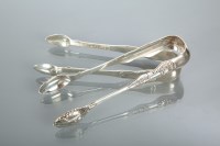 Lot 110 - TWO VICTORIAN SCOTTISH SILVER SUGAR TONGS...