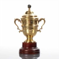 Lot 115 - SILVER GILT TROPHY AND COVER maker Garrards &...