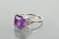 Lot 1115 - ART DECO AMETHYST AND DIAMOND RING set with a...