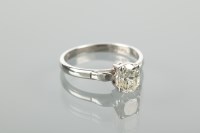Lot 1126 - DIAMOND SOLITAIRE RING the oval cut diamond...