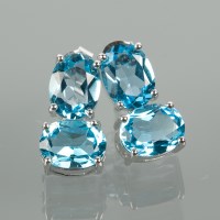 Lot 1138 - PAIR OF TOPAZ EARRINGS each set with two oval...