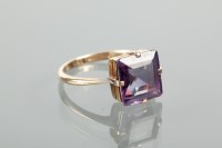 Lot 1146 - ALEXANDRITE SET RING set with a square...
