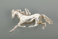 Lot 1162 - UNMARKED HORSE MOTIF PENDANT modelled...