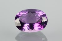 Lot 1176 - UNMOUNTED AMETHYST the oval stone...