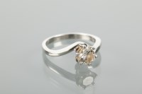 Lot 1180 - DIAMOND SOLITAIRE RING set with a brilliant...