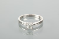 Lot 1189 - DIAMOND SOLITAIRE RING set with a princess cut...
