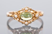 Lot 1217 - VICTORIAN STYLE PERIDOT AND SEED PEARL DRESS...