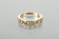 Lot 1241 - DIAMOND HALF ETERNITY RING set with seven...