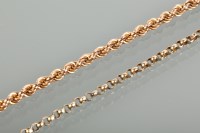Lot 1251 - NINE CARAT GOLD ROPE TWIST CHAIN 17g; along...
