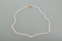 Lot 1256 - FINE GRADUATED PEARL NECKLACE the largest...