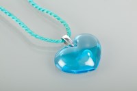 Lot 1297 - LALIQUE BLUE GLASS HEART PENDANT ON ROPETWIST...