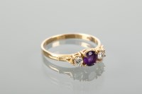 Lot 1299 - EIGHTEEN CARAT GOLD AMEYTHST AND DIAMOND THREE...