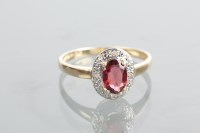 Lot 1300A - SAPPHIRE CLUSTER RING set with a cluster of...