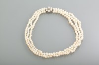 Lot 1394 - THREE STRAND CULTURED PEARL NECKLACE with...