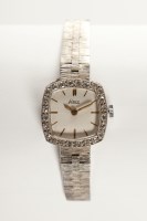 Lot 1066 - LADY'S DIAMOND SET COCKTAIL WATCH with an...