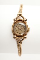 Lot 1069 - LADY'S GOLD ELITA WRIST WATCH the dial with...