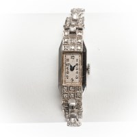 Lot 1568 - LADY'S ART DECO PLATINUM AND DIAMOND COCKTAIL...