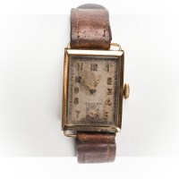Lot 1569 - GENTLEMAN'S ART DECO NINE CARAT GOLD WRIST...