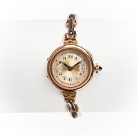 Lot 1574 - LADY'S EARLY TWENTIETH CENTURY NINE CARAT GOLD...