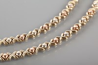 Lot 1738 - NINE CARAT GOLD TRI COLOUR GOLD NECKLACE AND...