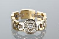 Lot 1742 - UNUSUAL DIAMOND RING the round bezel with...