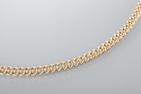 Lot 1745 - HEAVY NINE CARAT GOLD CURB LINK NECKLACE...