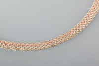 Lot 1746 - TRI COLOUR NINE CARAT GOLD NECKLACE in yellow,...