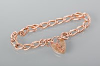 Lot 1748 - NINE CARAT GOLD CURB LINK BRACELET each link...