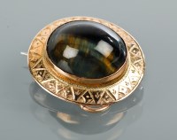 Lot 1750A - VICTORIAN CHATOYANT TIGER'S EYE SET BROOCH the...