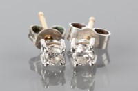 Lot 1774 - PAIR OF DIAMOND STUD EARRINGS set with...